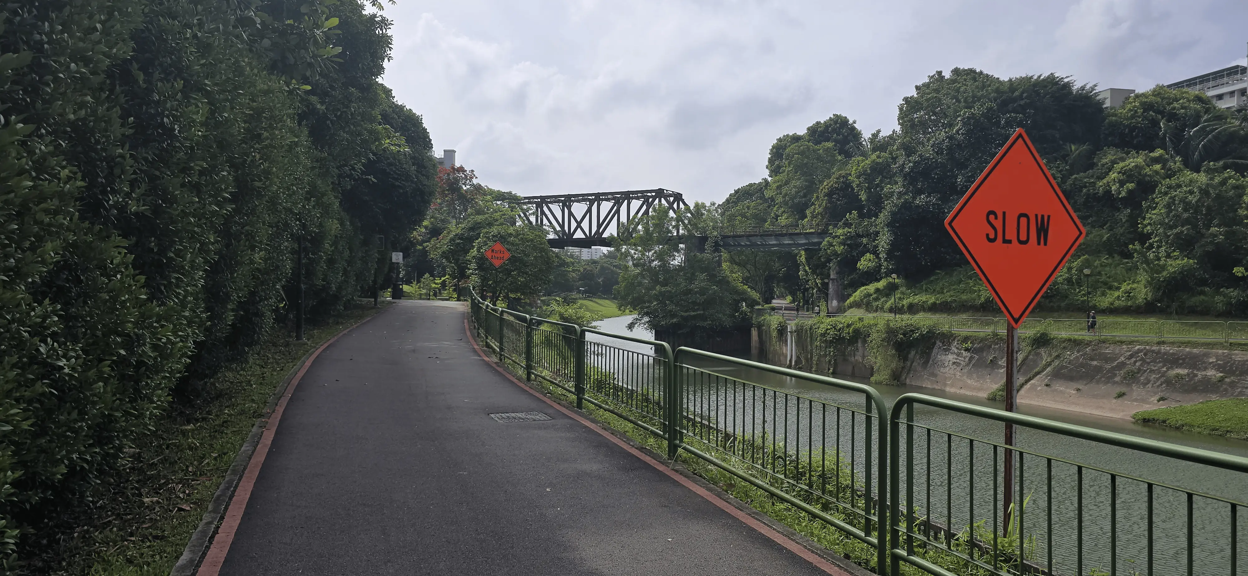 A picture of the Ulu Pandan Park Connector and an old Jurong Railway Bridge crossing Sungei Ulu Pandan.