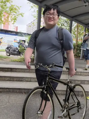 Xavier reuniting with his long lost bike at Yio Chu Kang.